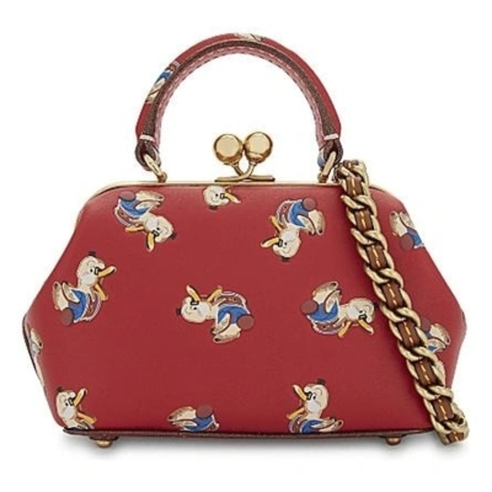 ISO/NFL: Coach Kisslock 19 Mini Bag with Dr Doodle Print